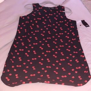 Sleeveless black dress with cherries